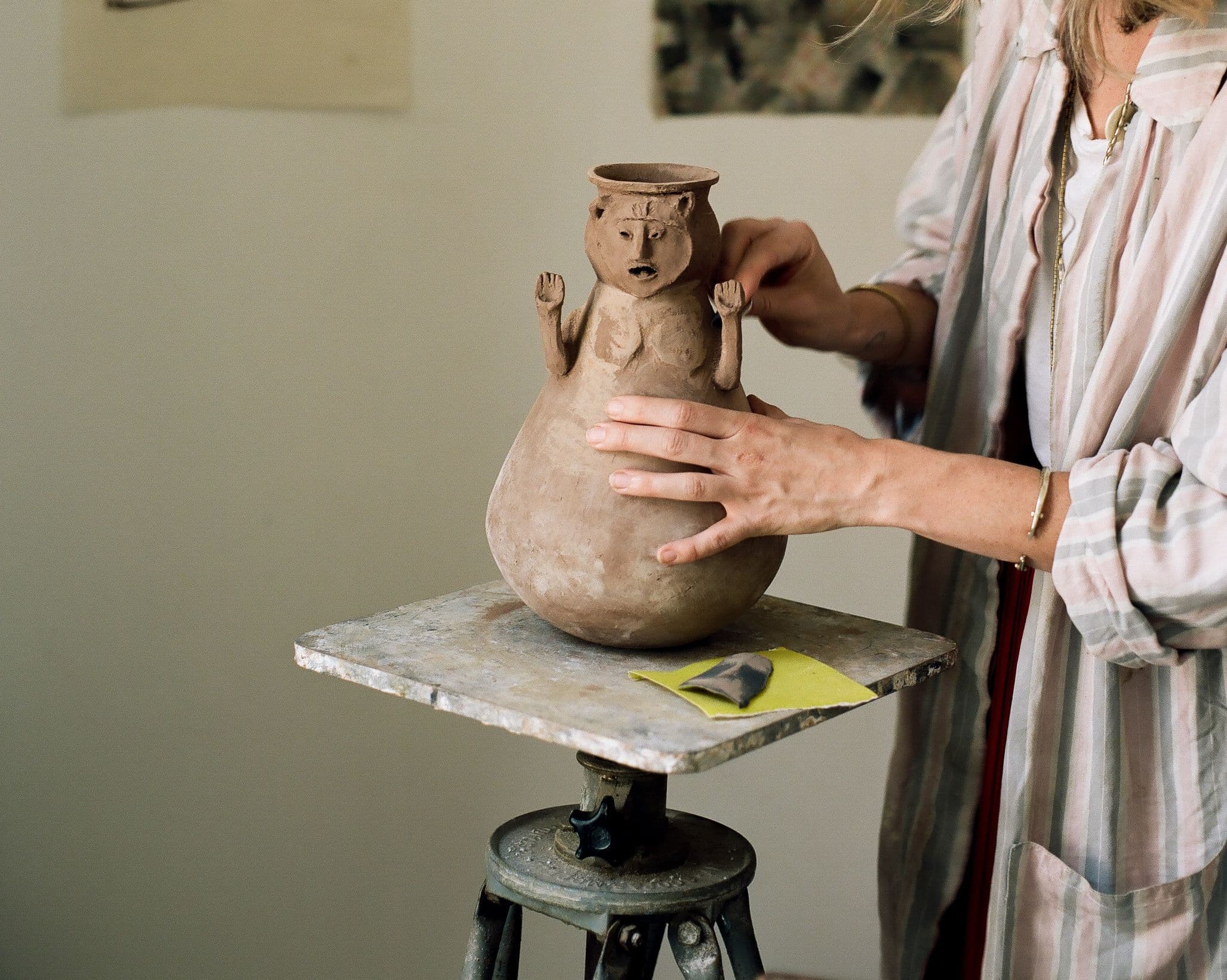 working-on-clay-vessel.jpg